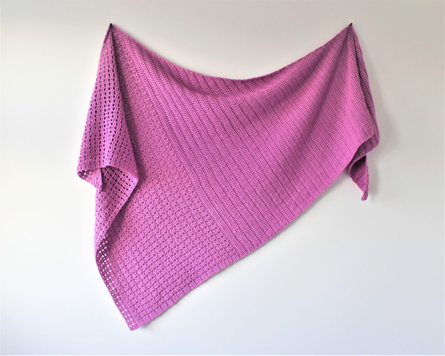 This is the brielle shawl this shawl features an asymmetric design.