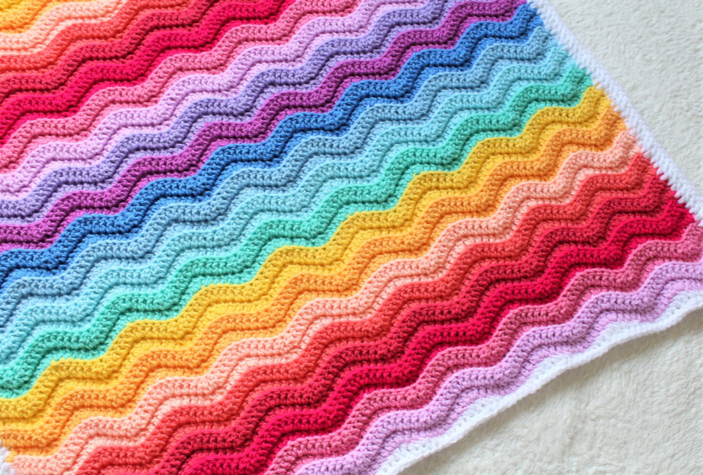 chunky-rainbow-ripple-baby-blanket-free-crochet-pattern-truly-crochet