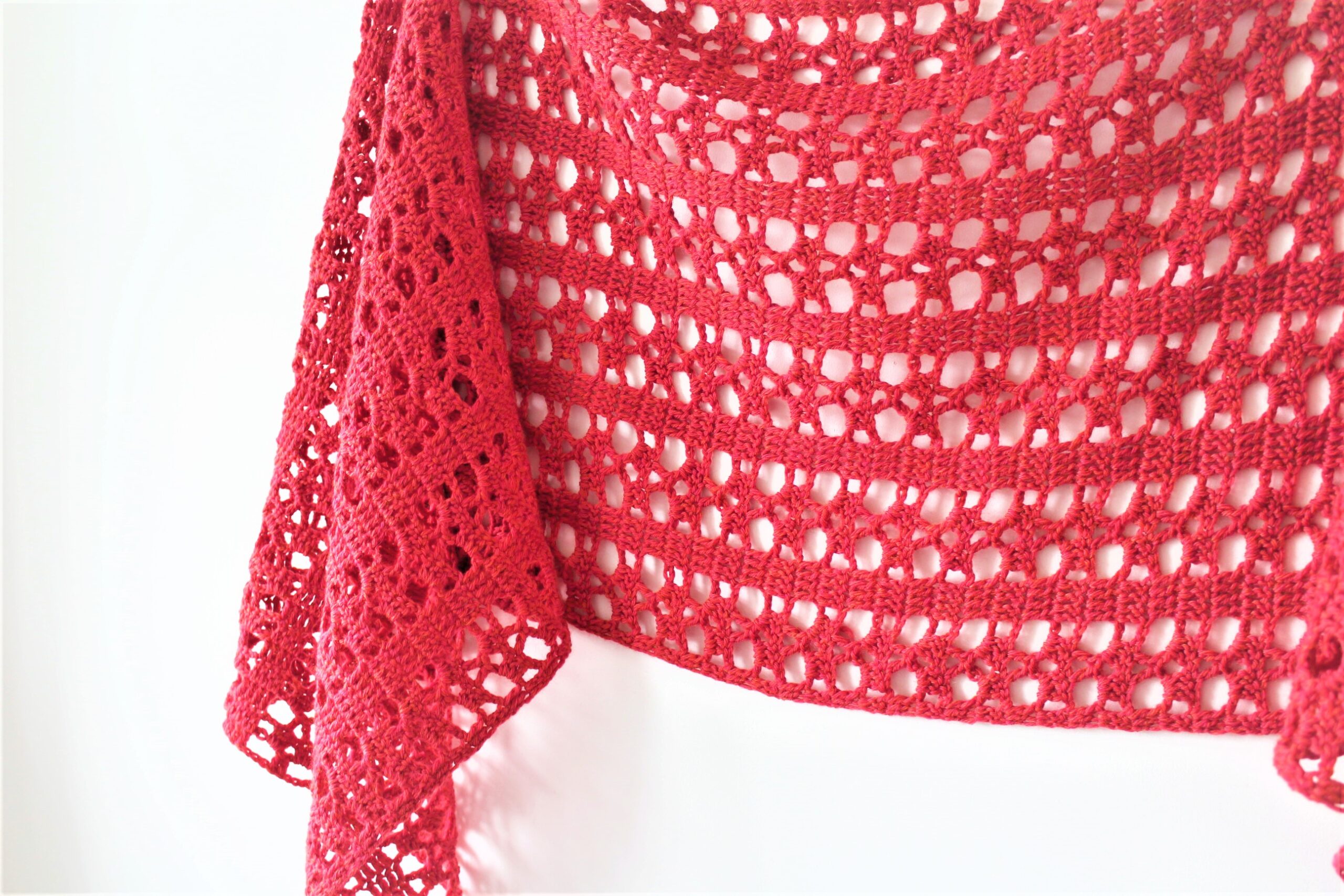 The Lucia sideways shawl is a beautiful lacy crochet shawl 