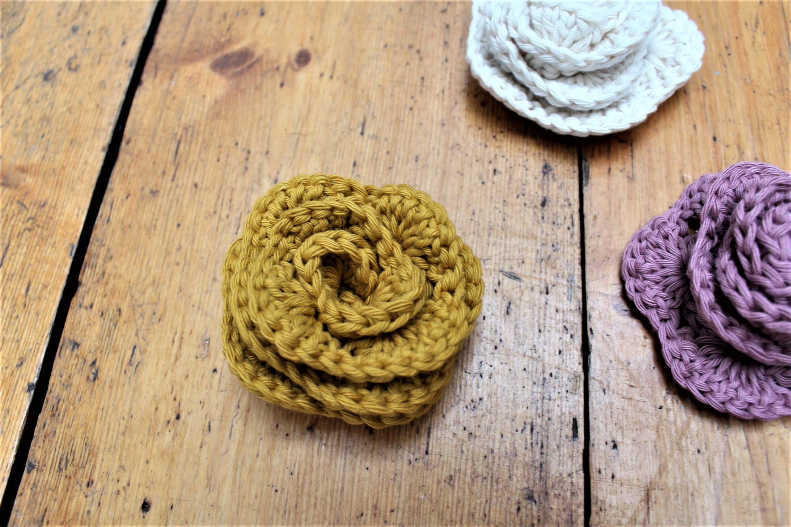 close up of the crochet flower applique